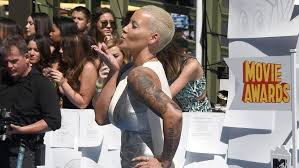 Quote tattoos and words are found on his chest, fingers and back. Where Did Amber Rose S Wiz Khalifa Tattoo Go Mtv