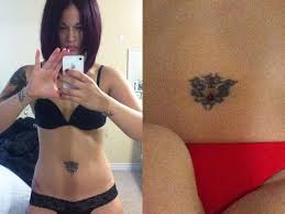A tattoo that depicts a cultural heritage is fairly in demand. Charli Baltimore Tribal Design Stomach Tattoo Steal Her Style