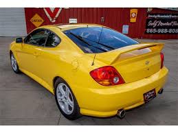 Image result for Sunny Yellow 2003 Tiburon