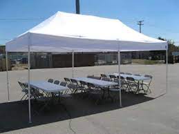 10x20 tent with 3 banquet tables canopy tent rental event tent tent rentals