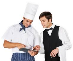 Complementos cómo delantales y gorros de cocina. Uniformes Hosteleria