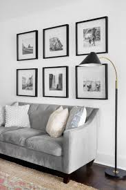Black And White Gallery Wall Black And White Photo Grid Gallery Wall Black And White Travel Photos In Black Ikea Frames In 2020 Picture Wall Living Room Gallery Wall Living Room Frames On Wall