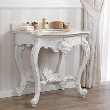 Go to a flea market and buy an old dresser, give it a worn look or a whitewashed one, paint it patina or grey and sand. Bathroom Vanity Console Luigi Filippo Shabby Chic Style Antique White Marble Cream Simone Guarracino Luxury Design