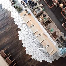 Marble Meets Wood Floors Coffee Shop Design Cafe Design Shop Design