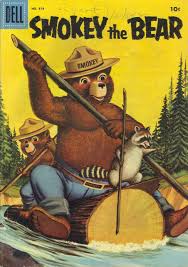 There is one junior forest ranger patch, one smokey 50 years pinback button, one smokey's helper pinback button, one tab button and 2 different lapel pins. 0818 Smokey Bear Dell Comics Western Publishing