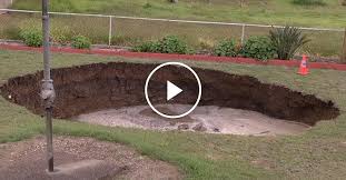 sinkhole opens in australian backyard