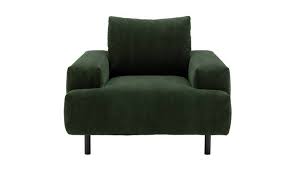 A wingback or high back armchair can create a great reading spot, with a strategically positioned floor lamp placed beside it. Buy Habitat Julien Fabric Armchair Green Armchairs Habitat