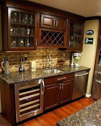The basement bar transforms into an even more enticing option when you turn it into a fun hangout. Basement Remodel With Bar Area Basementremodel Basement Bar Designs Bars For Home Basement Bar Plans