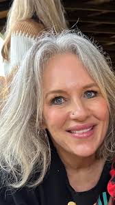 Can women with grey hair wear black clothing without looking washed out?