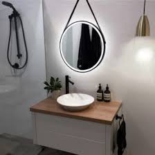 We actually have double vanities in most of the mountain house bathrooms, which makes it hard to do a single round mirror because it means that if you are staring at yourself in front of the faucet, say, brushing your. Black Framed Strap Hanging Led Round Mirror 60cm Free Delivery