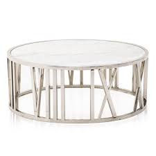 The simple open cross brace design articulates refinement and elegance echoed by the luxury of black marble. Chrome And Marble Coffee Table Modernica Props