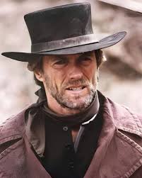 Which actor rode the saddle best in the golden age of the western genre,  Clint Eastwood, John Wayne, Randolph Scott, or another choice?