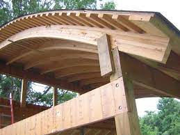 A bespoke variation of the cheshunt timber bench, in curved form, supplied in small sections, to enable the client to manoeuvre the products to the rooftop. J Ullman Carpentry Llc Structures Timber Roof Timber Framing Timber Buildings