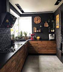 The designers changed the kitchen layout to add a dishwasher in the stove's former location. 26 Bold Black And Yellow Kitchen Designs Digsdigs