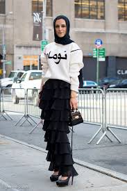 headscarf sweatshirt and long skirt