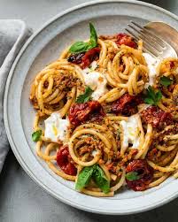 Bucatini With Burrata And Sicilian Almond Pesto A Robust Bucatini Pasta Dish Sauced With A Toasted Almond Dried Tomato Pasta Dishes Recipes Healthy Recipes