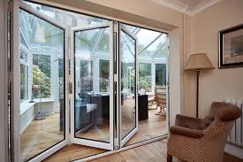 The company installs windows, doors, garage doors, roof trim, driveways, conservatories. Bi Fold Doors By Anglian Windows Ltd