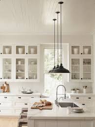 White Cabinets Marble Counters Black Lighting Fixtures Glass Doors Black Hardware Timeless Kitchen Modern Farmhouse Kitchens Home Kitchens