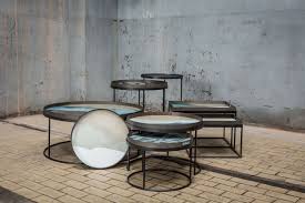 You can collect the table to get your daily necessities near. Round Tray Coffee Table Set