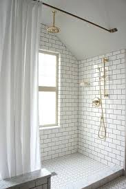 Classic And Chic Floor To Ceiling Subway Tile Is A Timeless But Fresh Update Sure To Make A White Brick Tiles Bathroom Brick Tiles Bathroom Bathrooms Remodel