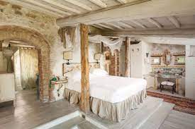 The artistically designed tuscan mediterranean style bedroom is the ideal location for soft romantic lighting, tuscan theme wall art and decorative mirrors. How To Decorate A Tuscan Style Home