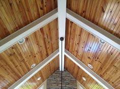 As a designer i find that few things transform a space as easily and dramatically as a from white painted rafters to rustic wood beams, discover the top 70 best vaulted ceiling ideas. Adding White Beams To A Natural Wood Ceiling Wood Beam Ceiling Painted Wood Ceiling Painted Beams