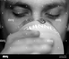 Glass of guinness hi-res stock photography and images