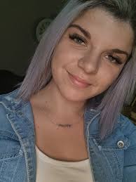 Could someone make this picture look like a unicorn? Her name is trinket  and I need a main picture for her! I don't want it AI or fake looking… just  a cute