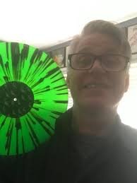 Hi all, Could someone pls take the sun spot of my brothers face and maybe  brighten this up if possible at all please and thank you!