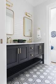 Black And Gray Marble Floor Tiles Lead To A Black Wooden Dual Bath Vanity Boasting A Slatted Shelf Grey Marble Floor Bathroom Interior Bathroom Interior Design