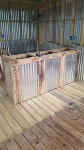 The only issue is performance. Front Of Bar With Tin And Pallet Wood Trim Almost Ready To Put On A Bar Top Pallet Bar Diy Backyard Bar Wood Bar Top