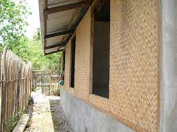 Concrete block lower walls, amakan uppers and nipa roof. Amakan Woven Bamboo Wall Cladding Philippines House Design Bamboo House Design Filipino House
