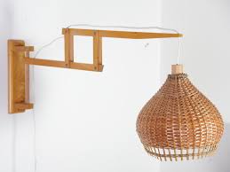 Add simple lighting solutions to any room in your home with modern wall sconces. Mid Century Slovakian Wicker Extendable Wall Lamp From Liptov 1970s For Sale At Pamono