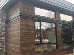 The Beautiful Look Of Wood Without The Work Distinction Wood Grain Steel Siding Vertical Wood Siding Exterior House Siding Wood Vinyl Siding