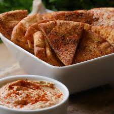 Spicy Pita Chips Recipe By Tasty Recipe Pita Chips Spicy Snacks Recipes Spicy Snacks