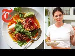 28 Alison Roman S Tomato Poached Fish With Chile Oil Nyt Cooking Youtube Nyt Cooking Poached Fish Poached Fish Recipes