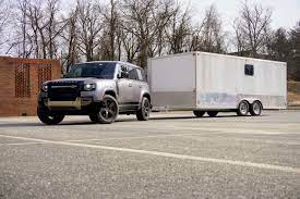 One of the most important things to look for in vehicle if you plan on spending a lot of time outdoors is a vehicle with a great towing capacity. 2020 Land Rover Defender 110 Towing Test Can It Handle An Enclosed Trailer Out Motorsports