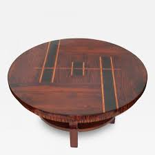 Many of the coffee tables in our guide come with storage space, ideal for hiding away living room clutter, or indeed for hiding away cocktail paraphernalia. Original Art Deco Rosewood Inlaid Coffee Table