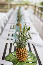You'll find our white pineapples in products made around the island. Hawaii Wedding Decor Black White Wedding Decor Destination Wedding Decor Hawaii Wedd Pineapple Centerpiece Pineapple Wedding Destination Wedding Bouquets