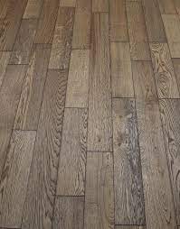 Rustic wood floors offer more interest and attraction than polished or traditional wood floors, and used in any setting, they can help enhance and highlight the decor. Aged Rustic Brown Oak Brushed Oiled Solid Wood Flooring Direct Wood Flooring