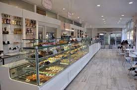 Arredamento La Compagnia Del Dolce Siciliano Pasticceria Localita Piombino Li By Taglioli Arredamenti Pasticceria Patisserie Bakery Desi Shop Interiors Interior