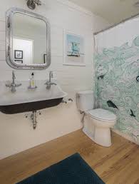 Below the wallpaper is white subway tile. 31 Nautical Coastal Beach Bathroom Decor Ideas Sebring Design Build