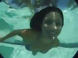 Redhead simonna showing her body underwater. Redhead Mia Stripping Underwater