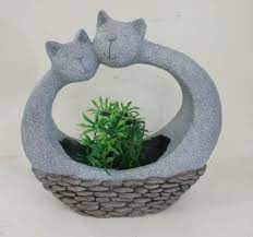The planters double as a retaining wall, the steps makes caring for the plants easy, and the wavy design of the blue slide suggests a waterfall while providing a play area for kids. Cute Cat Design Bonsai Cement Concrete Flower Pots Garden Magnesium Oxide Flower Pots China Magnesium Oxide Cat Flower Pot And Magnesium Oxide Cat Planter Price Made In China Com