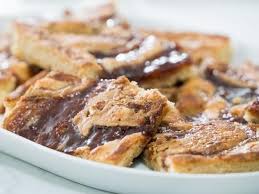 Whether you're making them for a party, santa, or just a cozy night in by the fireplace, there's always a reason to whip up a batch of cookies during the holidays. Peanut Butter And Jelly Cookie Bars Recipe Jelly Cookies Food Network Recipes Cookie Bar Recipes