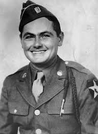 PVT Howard Katzander drives a German Kübelwagen with SGT “Reg” Kenny,  another war correspondent, French Resistance member, and a woman through  Paris