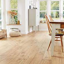 Create A Centre Piece To Your Room With Our Professional Fast Fit V Groove Tawny Chestnut Oak Laminate Floor Oak Laminate Flooring Rustic Oak Flooring Flooring