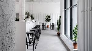 For establishments for the consumption of coffee, see coffeehouse. Asketik Creates Stark White Coffee Shop In Soviet Silk Factory