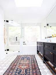 For daily updates & inspiration ⬇️ follow @bathroom_decor. Ditch The Bath Mat Luxe Area Rug Ideas For Your Bathroom Interiors By Jacquin