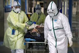 Coronavirus: Wuhan doctors battle outbreak in nappies as masks rub ...